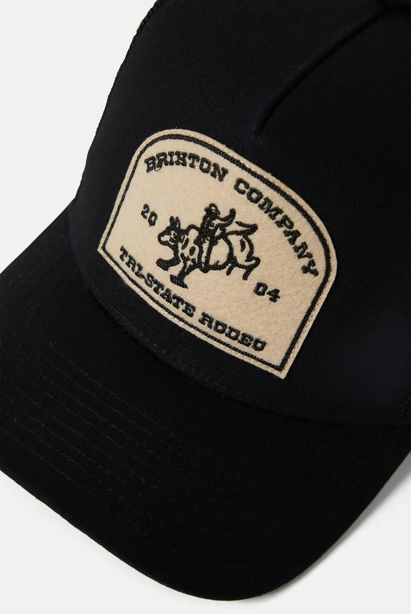 Unisex Danford Netplus Trucker Hat in the color Black/Black - Additional Laydown image