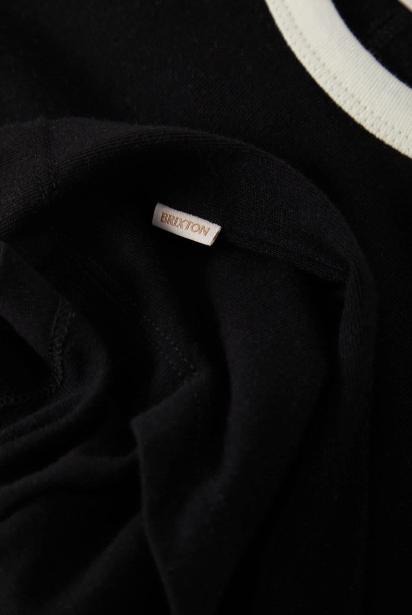 Women's Carefree Organic Garment Dye Ringer T-Shirt in the color Black/Off White - Additional Laydown image