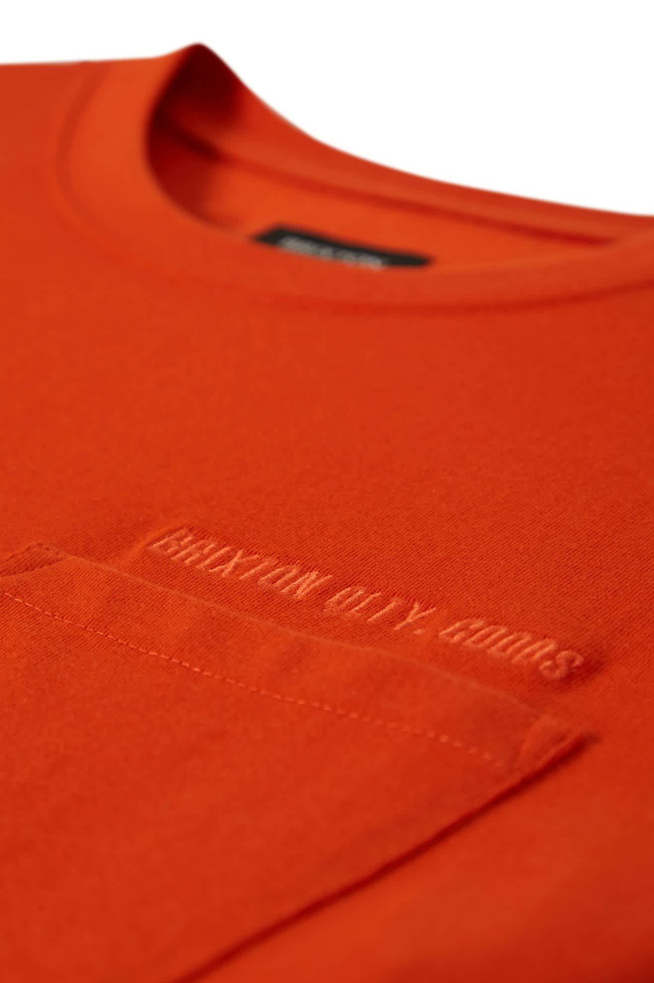 Men's Embroidered Heavyweight S/S Pocket T-Shirt in the color Trail Orange - Additional Laydown image