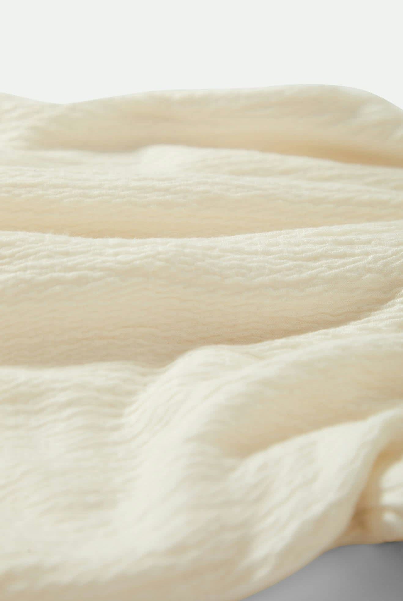 Women's Crinkle Tube Top in the color Off White - Additional Laydown image