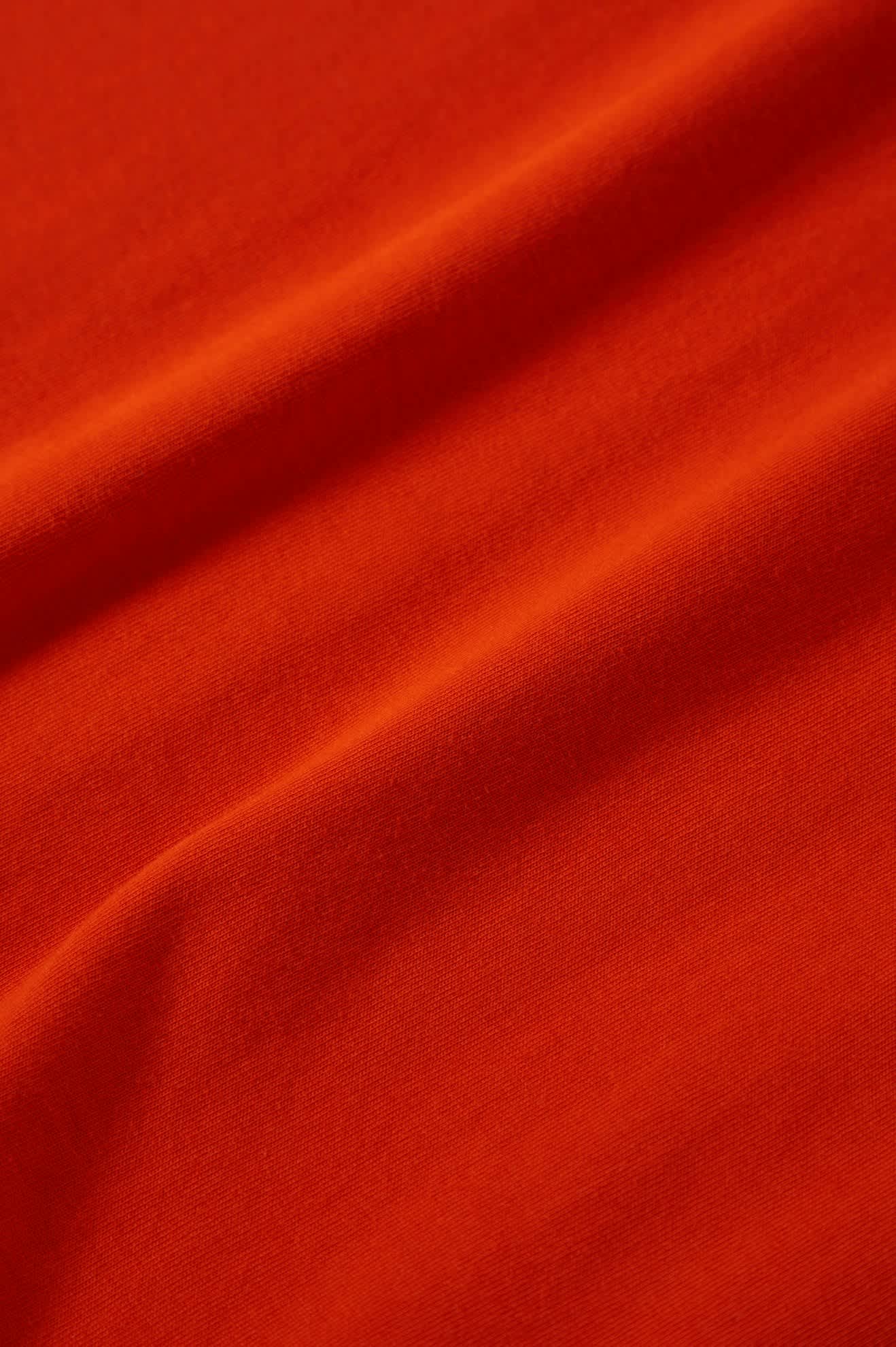 Men's Embroidered Heavyweight S/S Pocket T-Shirt in the color Trail Orange - Additional Laydown image