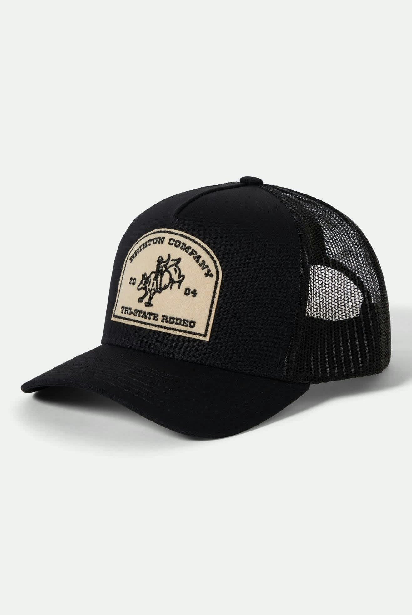 Unisex Danford Netplus Trucker Hat in the color Black/Black - Front Product View