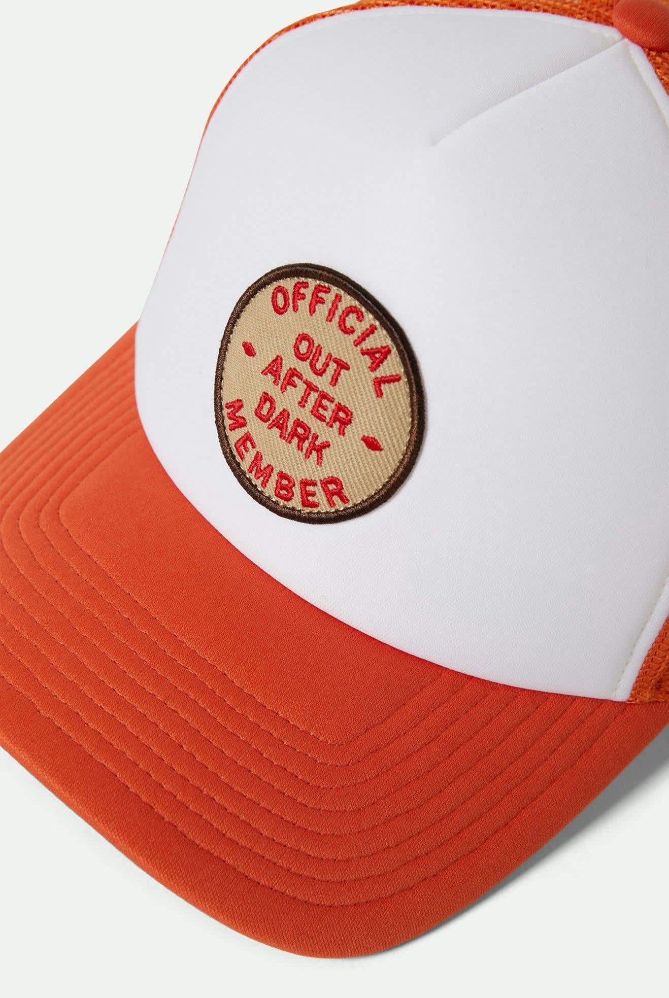 Women's Out After Dark Netplus Trucker Hat in the color Tangerine/Off White - Additional Laydown image