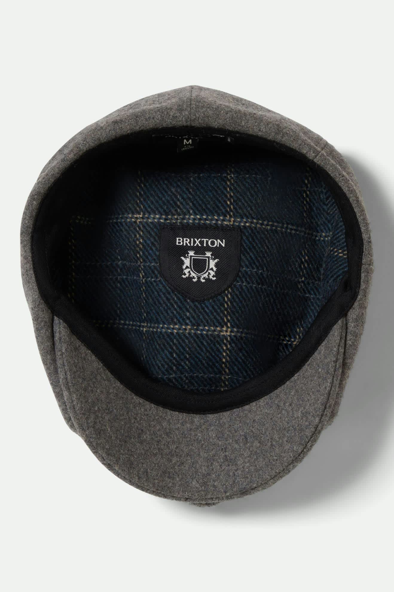 Unisex Brood Flannel Snap Cap in the color Dark Heather Grey/Washed Navy - Additional Laydown image