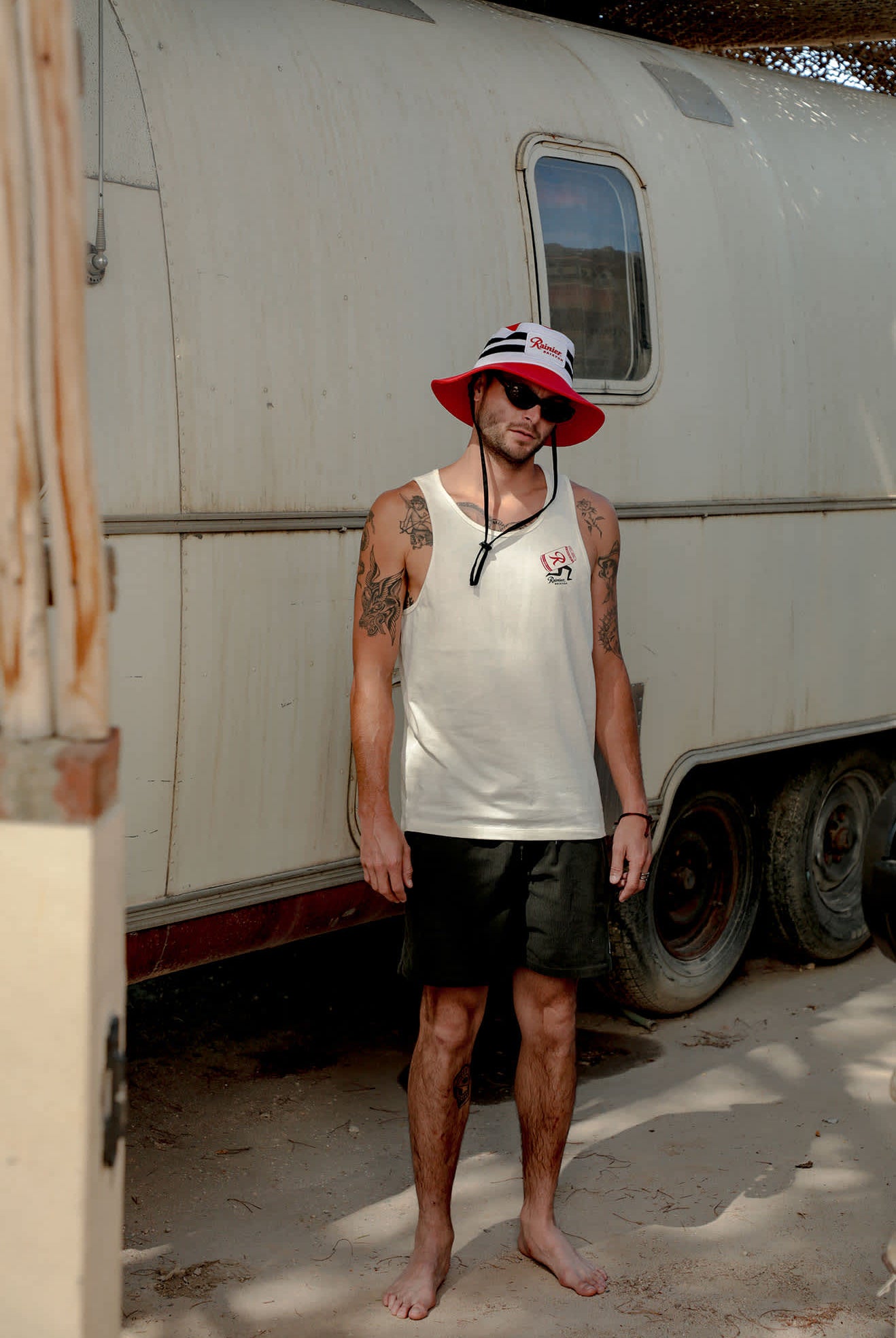 Men's Rainier Beer Run Tank in the color Natural - Men's Lifestyle image