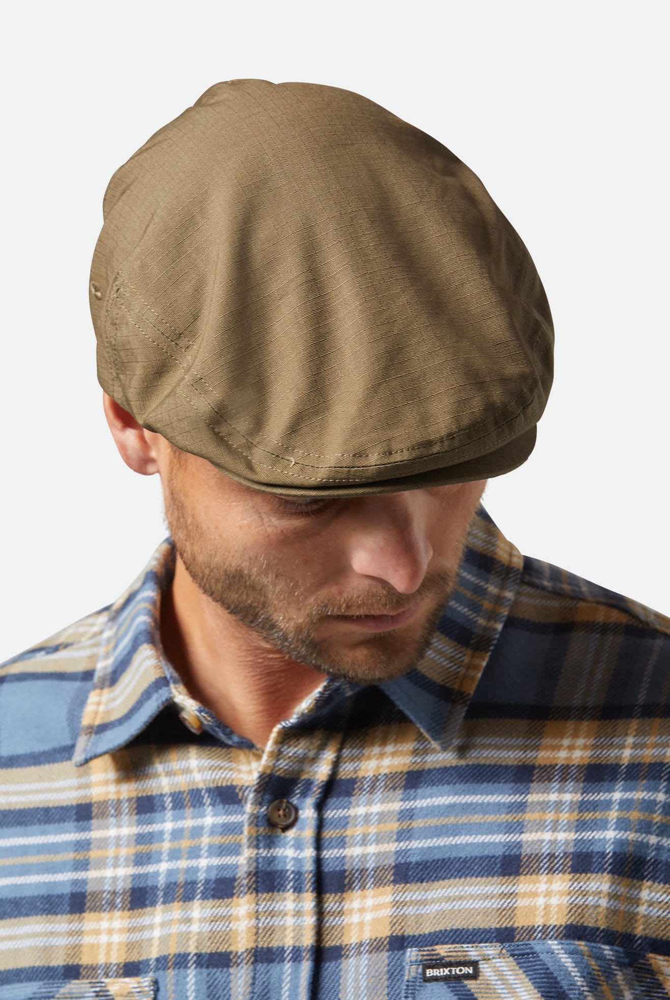 Unisex Hooligan Lightweight Flat Cap in the color Ivy Green Ripstop - Men's Front View