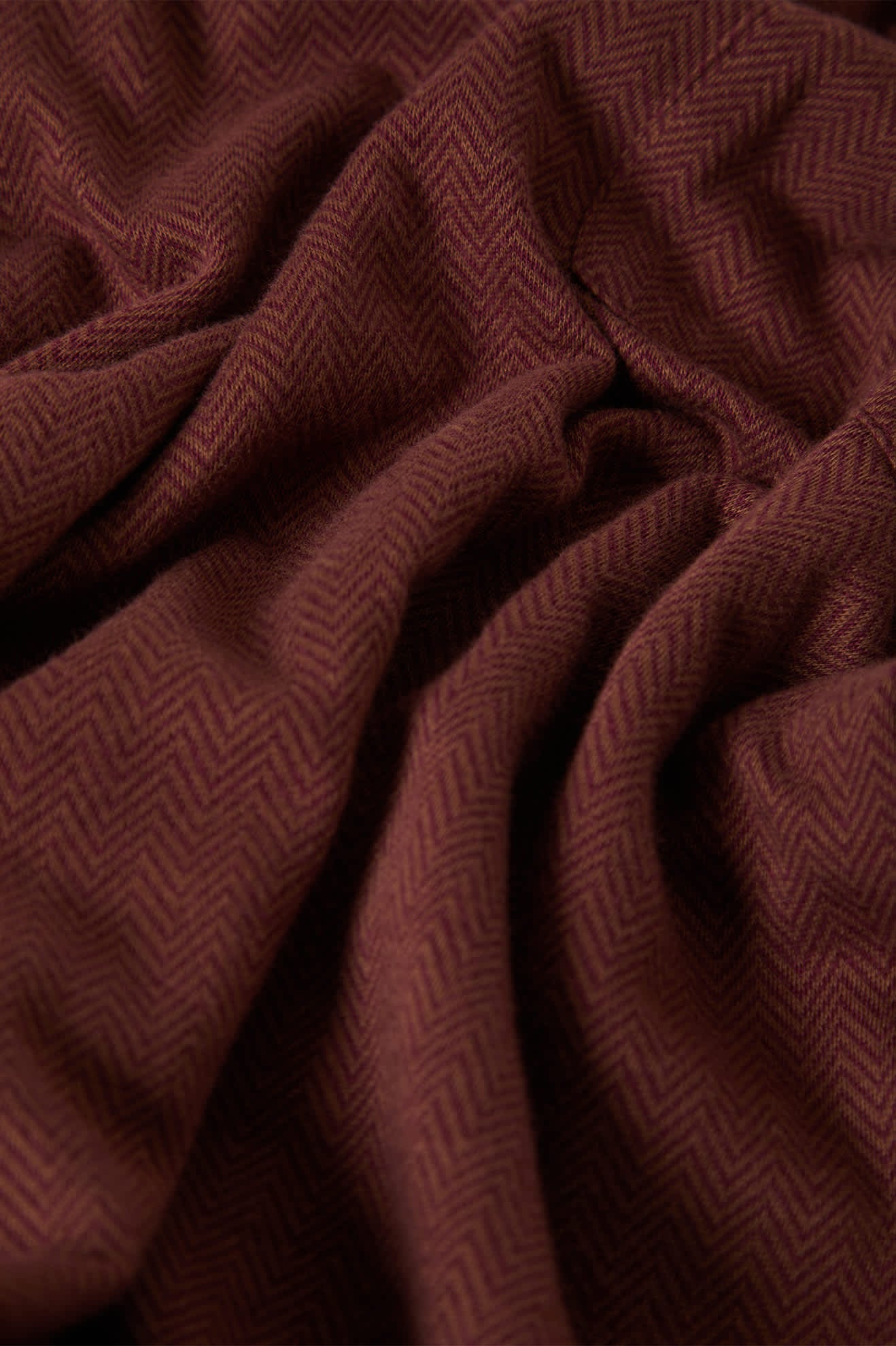 Men's Weekend Herringbone S/S Polo in the color Port/Pinecone Brown - Additional Laydown image