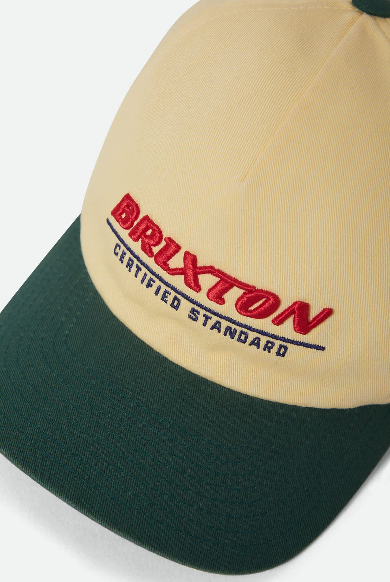 Unisex Brixton Certified Adjustable Hat in the color Washed Celestial Yellow/Mediterranean Teal - Additional Laydown image