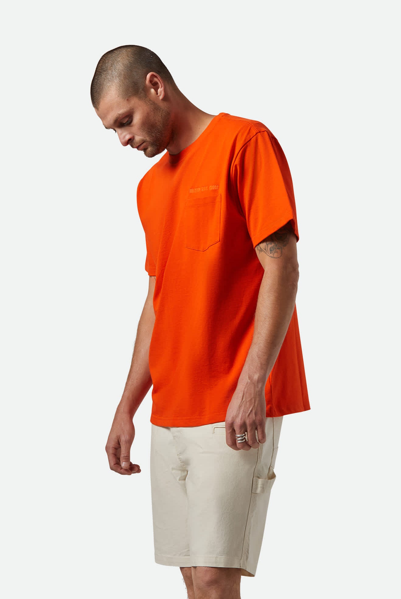 Men's Embroidered Heavyweight S/S Pocket T-Shirt in the color Trail Orange - Men's Side View