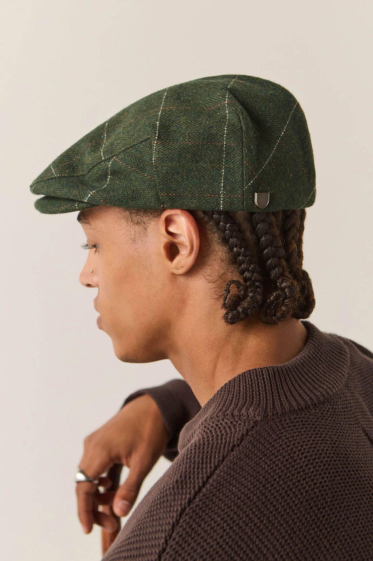 Unisex Hooligan Flat Cap in the color Moss/Orange - Men's Back View