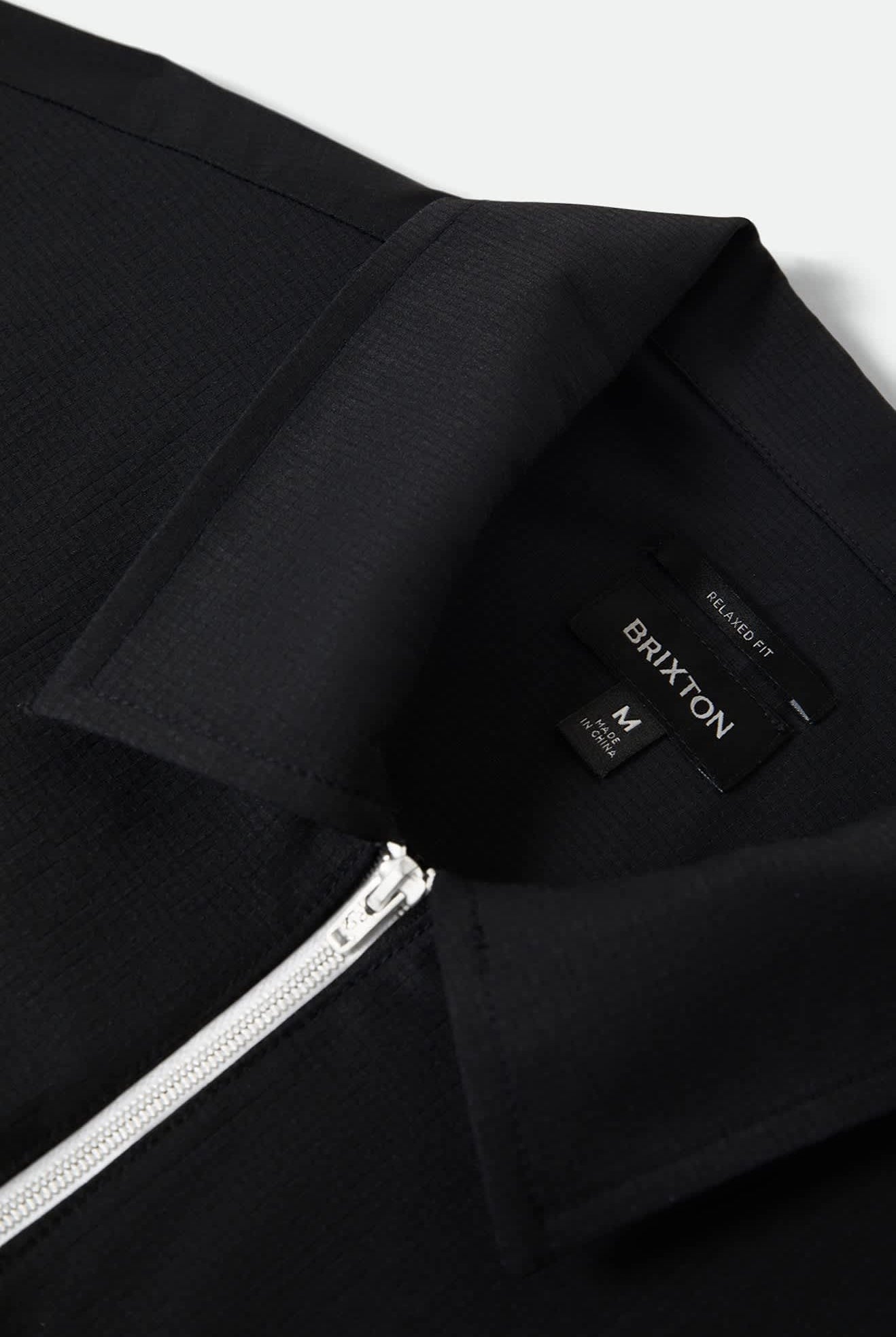 Men's Journey Lightweight 1/2 Zip Cropped Short Sleeve Shirt in the color Black - Additional Laydown image