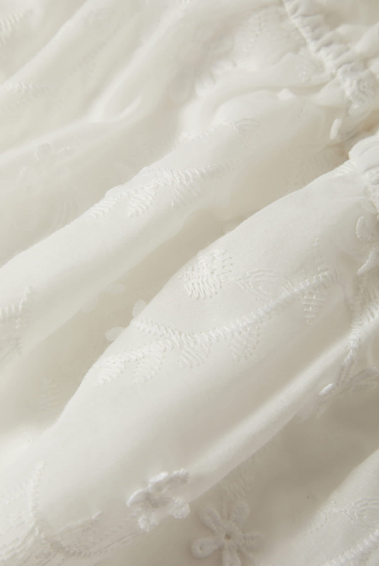 Women's The Abigail Tie Top in the color Off White Floral - Additional Laydown image