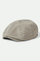 Unisex Brood Lightweight Newsboy Cap in the color Off White/Black/Grey Houndstooth - Front Product View