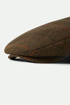 Unisex Hooligan Fleece Lined Earflap Snap Cap in the color Bronze/Black/Red - Additional Laydown image