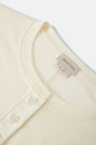 Women's Carefree Organic Garment Dye Cropped Henley in the color Off White/Rust - Additional Laydown image