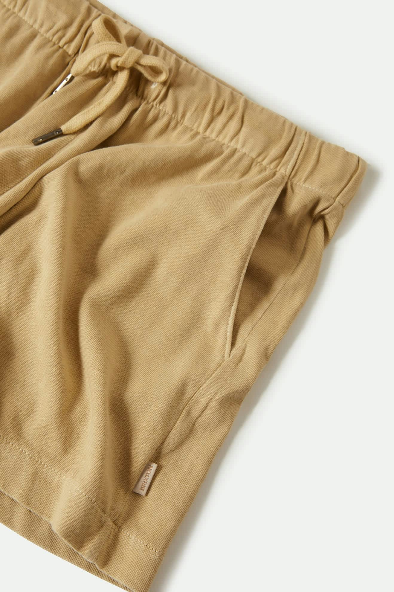 Women's Carefree Organic Garment Dyed Lounge Short in the color Pale Khaki - Additional Laydown image