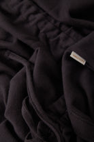 Women's Carefree Organic Garment Dye T-Shirt Dress in the color Black - Additional Laydown image