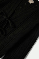Women's Cropped Pointelle Tie Cardigan in the color Black - Additional Laydown image