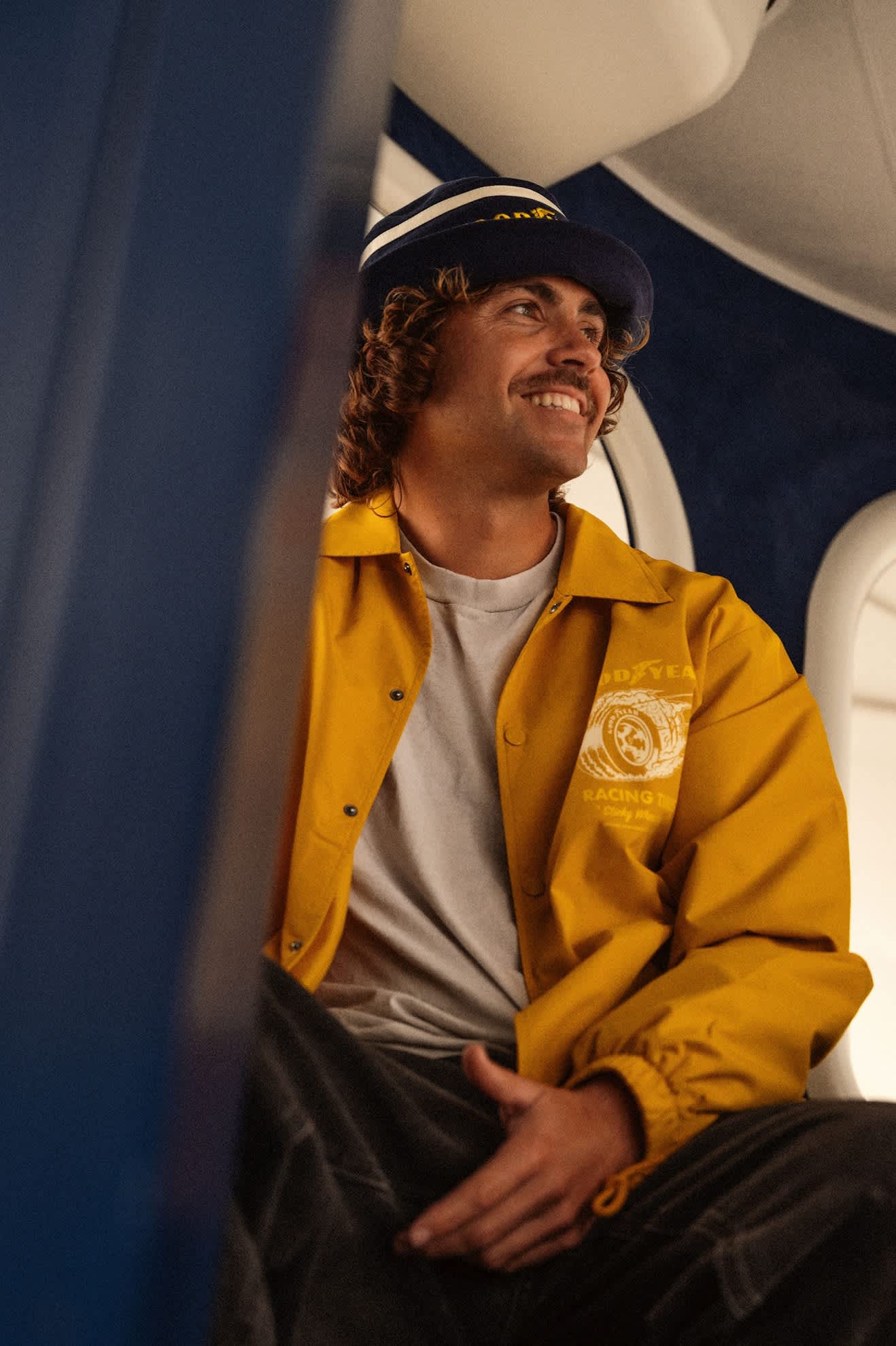 Men's Goodyear Slick Windbreaker in the color Nugget Gold - Men's Lifestyle image