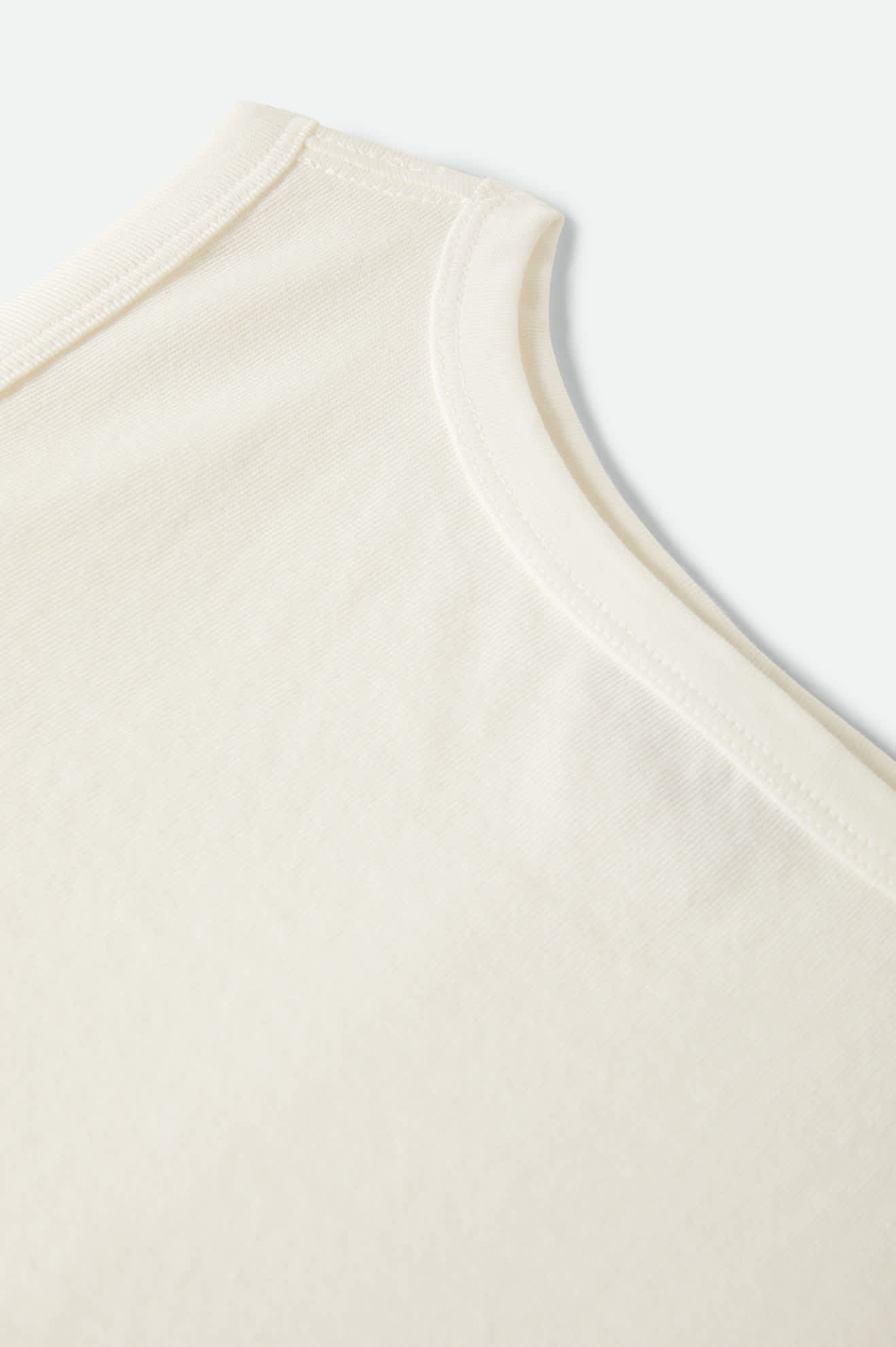 Women's Carefree Organic Garment Dye Cropped Tank in the color Off White - Additional Laydown image