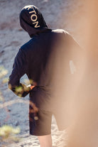 Men's Journey Long Sleeve Sun Hoodie in the color Black - Men's Lifestyle image