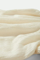 Women's Crinkle Tube Top in the color Off White - Additional Laydown image