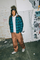 Men's Builders Bowery Stretch Water Resistant Flannel in the color Night Sage/Black - Men's Lifestyle image