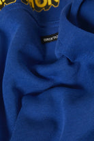 Men's Ford Mud Marathon Relaxed Fleece Hoodie in the color Ford Blue - Additional Laydown image