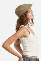 Unisex Brood Newsboy Cap in the color Dark Tan/Black Hickory Stripe - Women's Side View