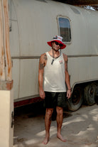 Men's Rainier Beer Run Tank in the color Natural - Men's Lifestyle image