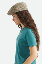Unisex Brood Newsboy Cap in the color Dusted Ochre/Khaki/Verdant Green - Women's Side View