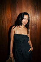 Women's Eden Smocked Jumpsuit in the color Black - Men's Lifestyle image