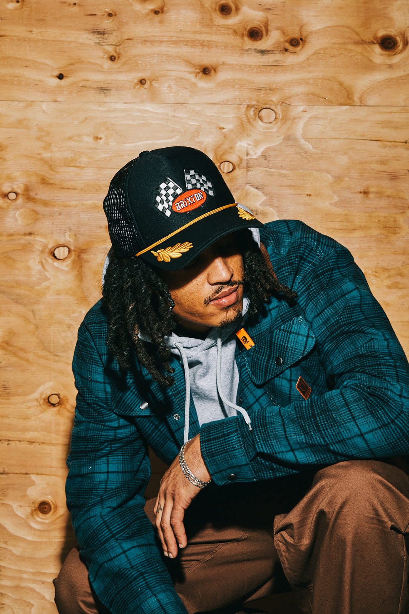 Women's Podium Netplus Trucker Hat in the color Black/Black - Men's Lifestyle image