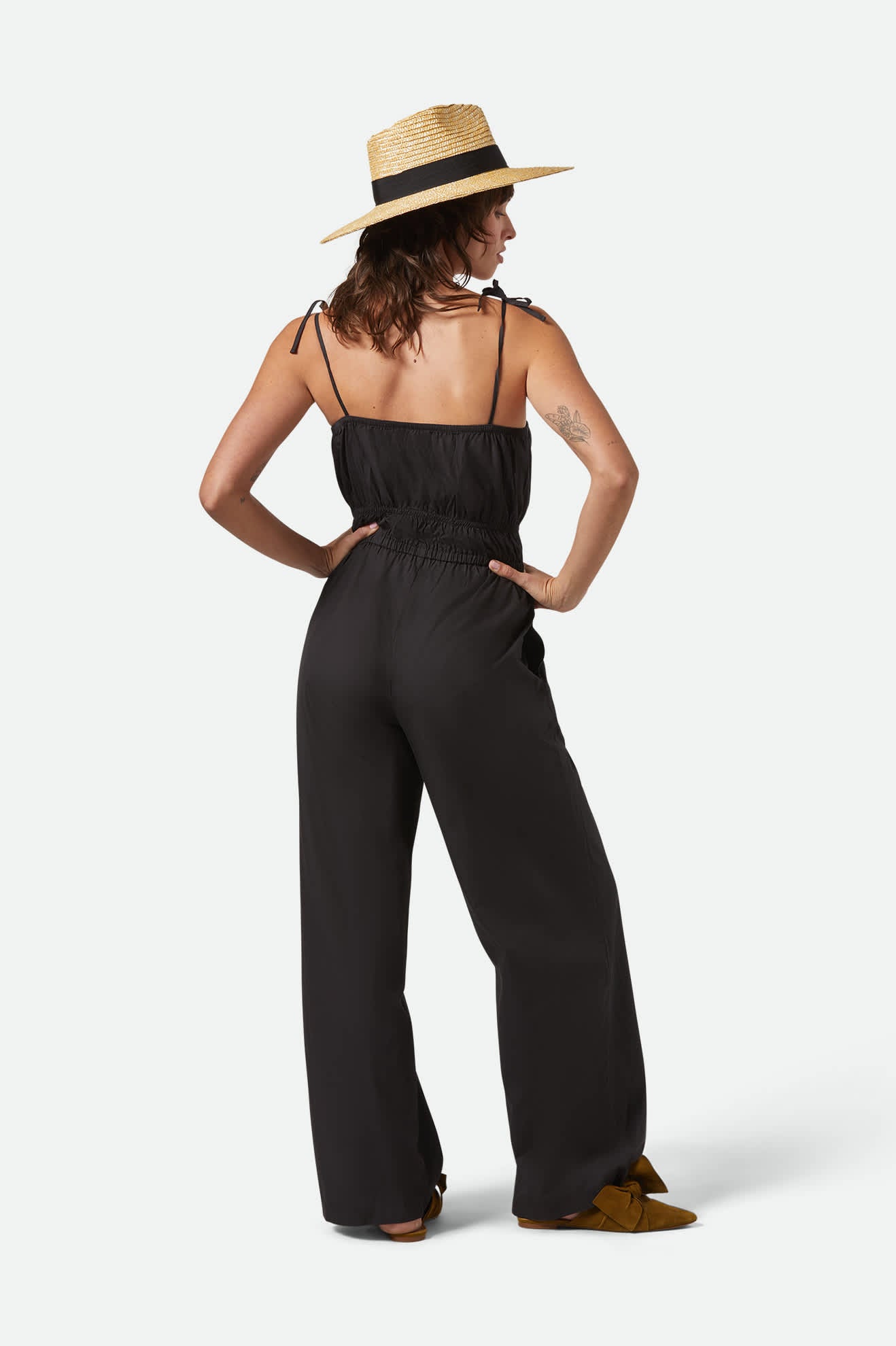 Women's Eden Smocked Jumpsuit in the color Black - Women's Back View