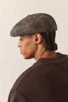 Unisex Brood Newsboy Cap in the color Slate Blue/Sepia/Orange - Men's Back View