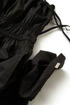 Women's Eden Smocked Jumpsuit in the color Black - Additional Laydown image