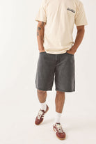 Men's Brixton Relaxed Short in the color Washed Black Denim - Additional Fit image