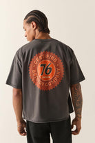 Men's 76 Certified Relaxed T-Shirt in the color Washed Black - Men's Back View