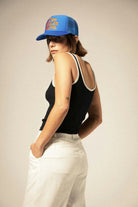 Women's Two Dollar Pistol Netplus Trucker Hat in the color Electric Blue/Electric Blue - Women's Side View