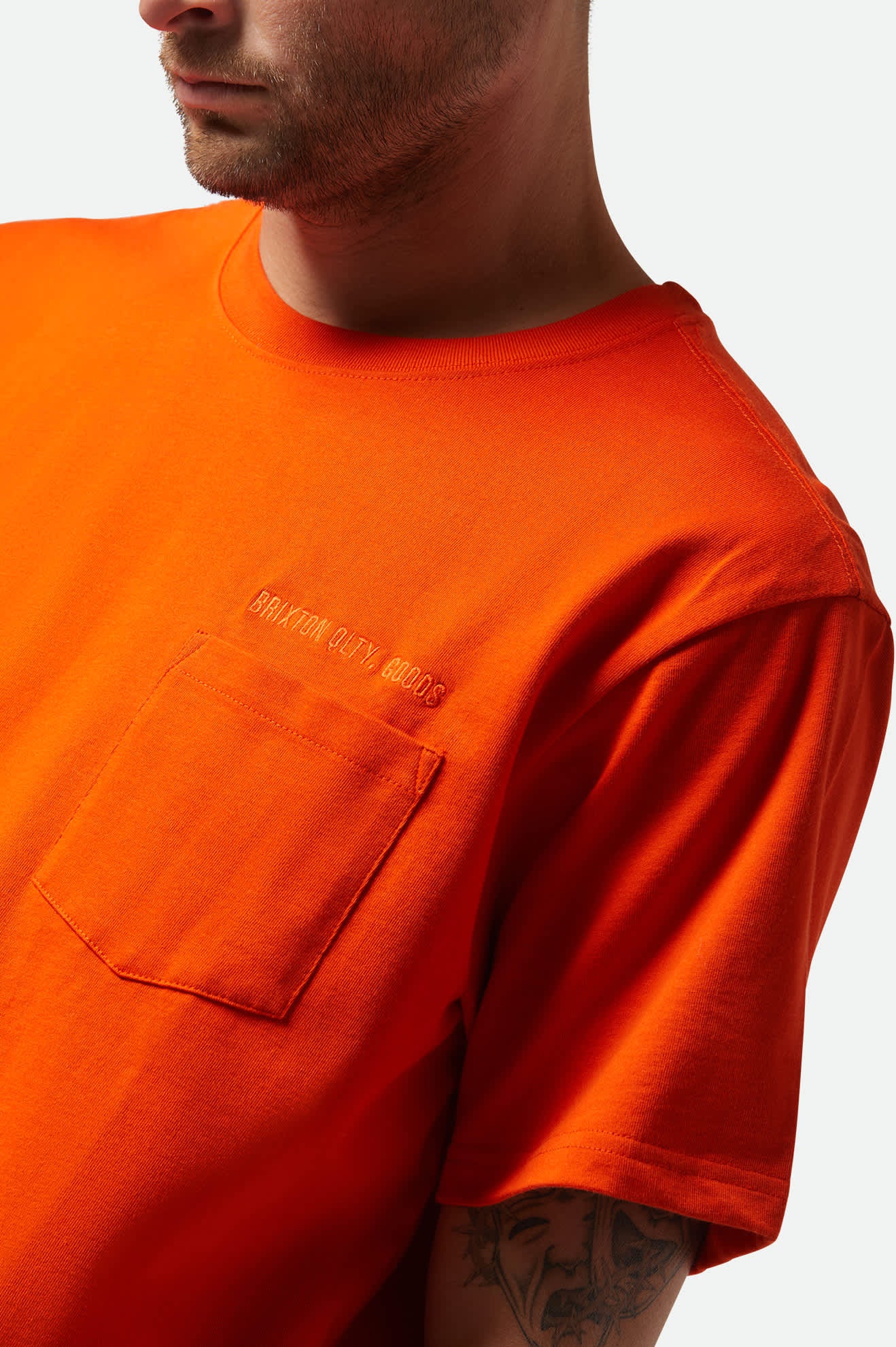 Men's Embroidered Heavyweight S/S Pocket T-Shirt in the color Trail Orange - Additional Fit image