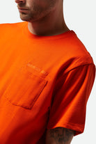 Men's Embroidered Heavyweight S/S Pocket T-Shirt in the color Trail Orange - Additional Fit image