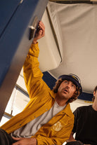 Men's Goodyear Slick Windbreaker in the color Nugget Gold - Men's Lifestyle image