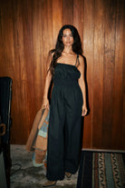 Women's Eden Smocked Jumpsuit in the color Black - Men's Lifestyle image