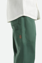Men's Builders Carpenter Stretch Pant in the color Primary Green - Additional Fit image