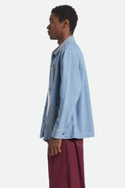 Men's Herringbone Lightweight Chore Coat in the color Light Wash Denim Herringbone - Men's Side View