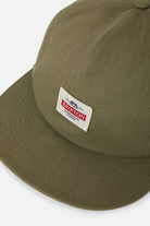 Unisex Pinnacle Snapback in the color Washed Olive Green - Additional Laydown image