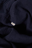 Women's Utility Everyday Barrel Pant in the color Washed Navy - Additional Laydown image