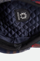 Unisex Barrel Earflap Snap Cap in the color Navy/Green/Red/Cream - Additional Laydown image