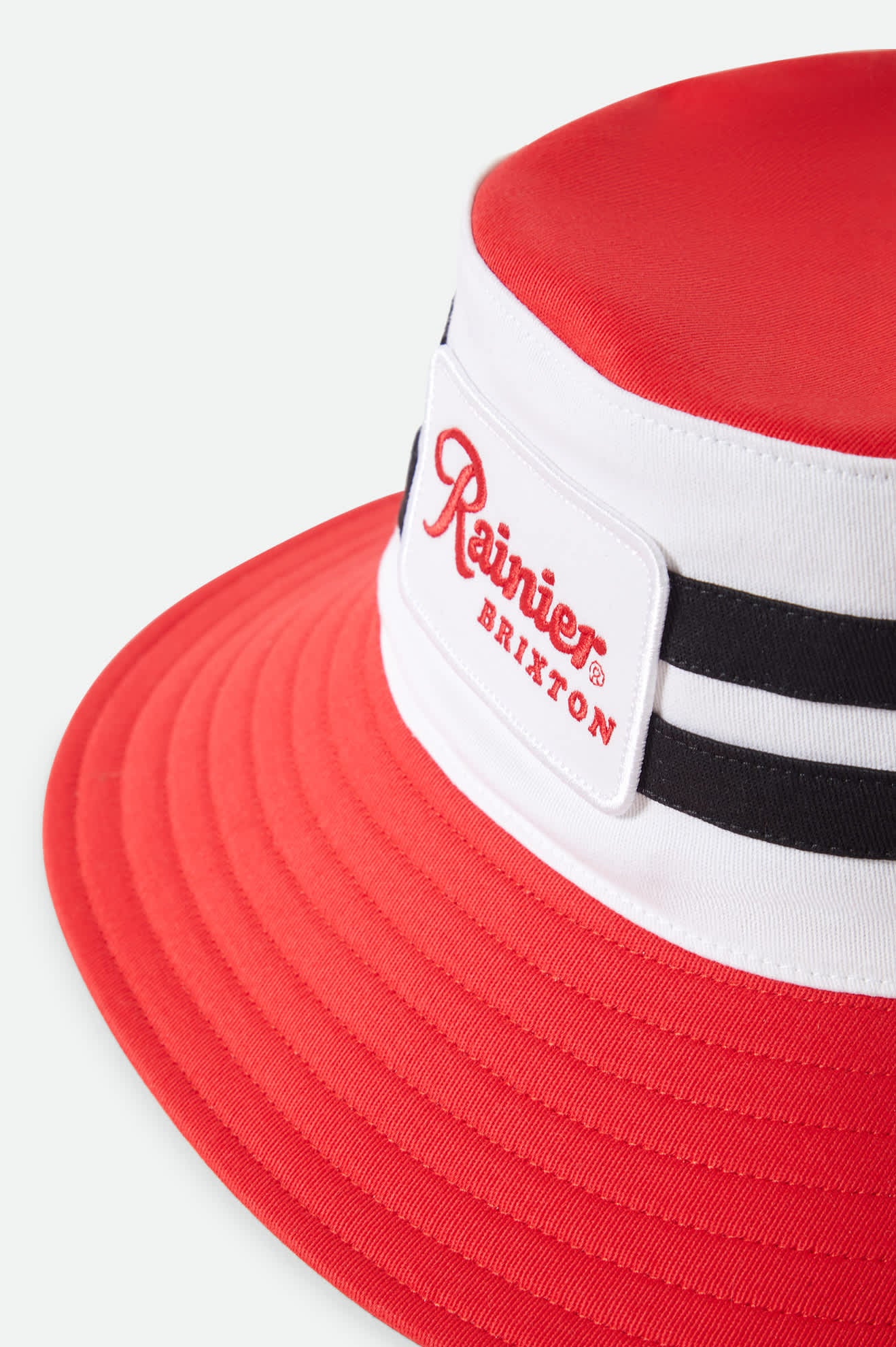 Unisex Rainier X Brixton Boonie in the color Natural/Red - Additional Laydown image