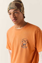 Men's 76 Minute Man Standard T-Shirt in the color Washed Orange - Additional Fit image